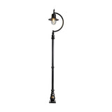 Vintage Cast Iron Lamp Post 2.8m in black, with a curved goose-neck arm holding a single teardrop shade over a clear glass dome, set on a decorative base plate against a plain white background.