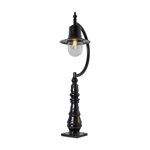 Large vintage black cast iron pedestal post light with curved gooseneck arm, teardrop shade over clear glass dome, single E27 bulb, and decorative pillar base with square mount.