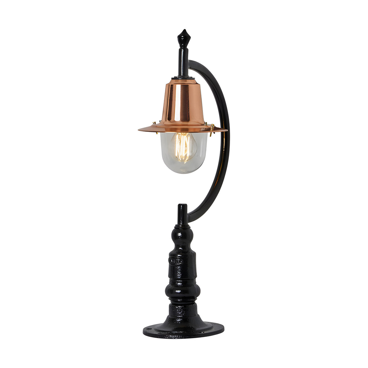Small vintage pillar light for flat piers with a black gooseneck curve, copper teardrop shade, clear glass dome, and traditional cast base, shown on a white background.