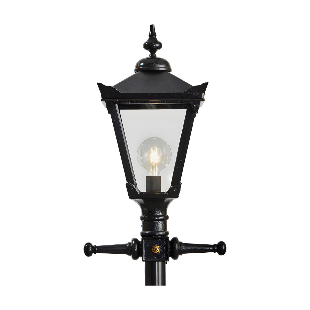 Victorian Manor 3m cast iron lamp post in black, close-up of the lantern head with clear glass panels, decorative finial, and exposed bulb, on a plain white background.