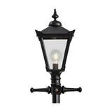 Victorian Manor 3m cast iron lamp post in black, close-up of the lantern head with clear glass panels, decorative finial, and exposed bulb, on a plain white background.