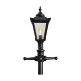 Victorian Manor cast iron lamp post in black with a lantern-style head, clear polycarbonate glazing, decorative finial, and cross-arm brackets on a slim column, shown against a plain white background.