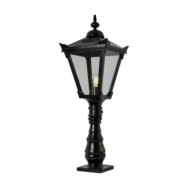Small Victorian Manor cast iron pedestal post light in black, with a slim ornamented column, lantern-style glass head, single E27 bulb and square base, shown on a plain white background.