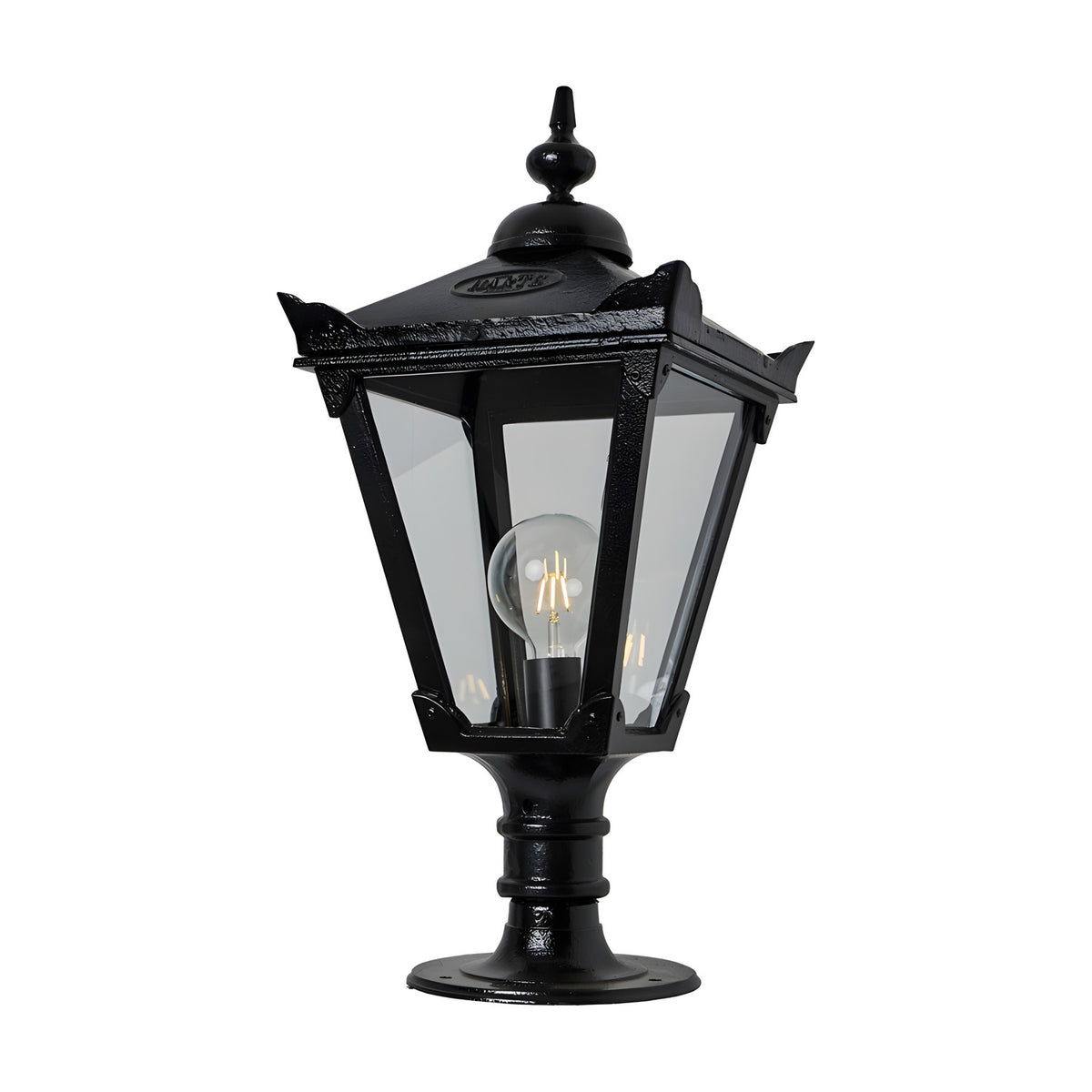 Victorian Manor cast iron pillar light in black with a slim traditional lantern head, clear glass panels, decorative finial, and pedestal base, shown on a plain white background.