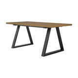 Hyde dining table with a whiskey-toned herringbone wood-effect top and angular black metal trestle legs, shown on a plain white background.