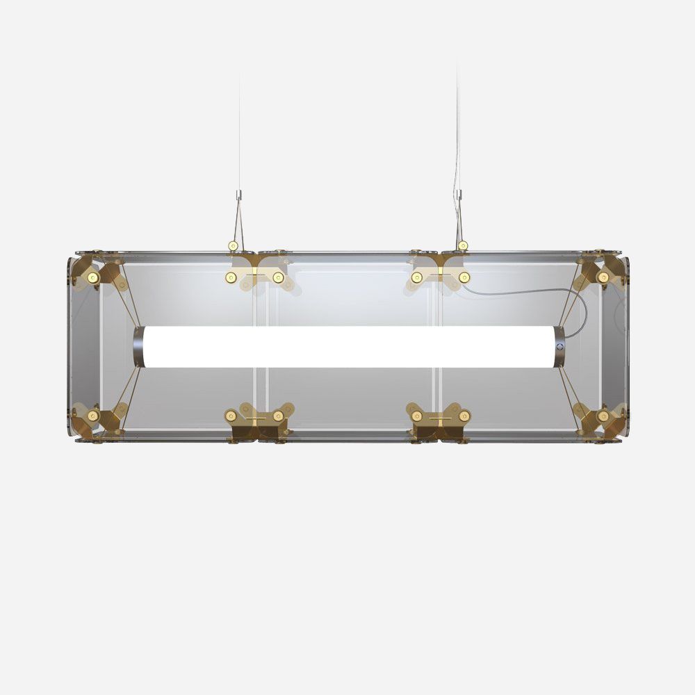 Presenting the Qbic LED Small Linear Suspension Light - Clear, which features a clear glass frame and gold accents for energy-efficient lighting. Suspended by thin wires against a plain white background, it encapsulates modern elegance.