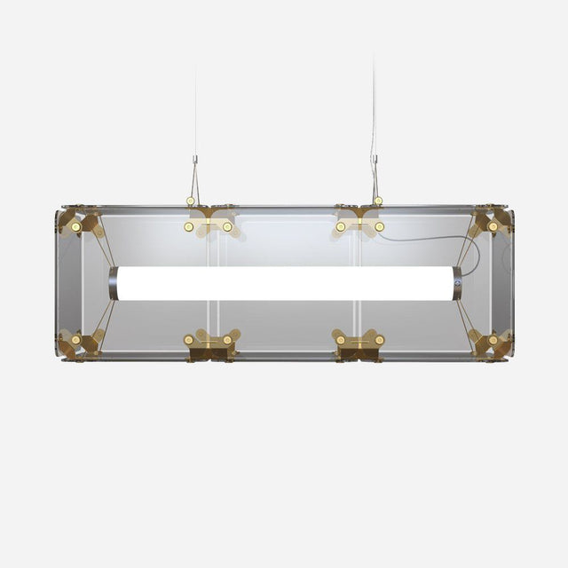 Presenting the Qbic LED Small Linear Suspension Light - Clear, which features a clear glass frame and gold accents for energy-efficient lighting. Suspended by thin wires against a plain white background, it encapsulates modern elegance.
