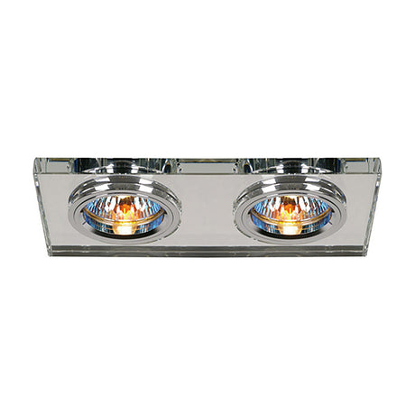 Clear crystal rectangular downlight rim with two lamp positions, chrome trims around each recessed light, shown lit on a plain white background.