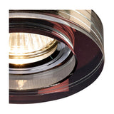 Close-up of the Crystal Round Downlight Rim in purple, 90mm face with 62mm cut-out, showing chrome trim and faceted glass edge around a halogen bulb.