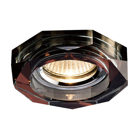 Crystal Downlight Rim in purple with a faceted octagonal profile, 62mm cut-out, 90mm diameter, shown with a lit GU10 bulb on a white background.