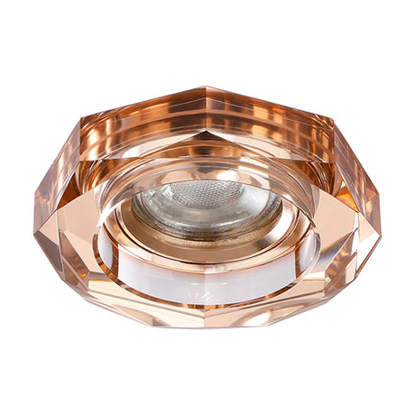 Crystal downlight rim in an octagonal cut design with a rose gold tone, 62mm cut-out, shown with a central bulb on a plain white background.