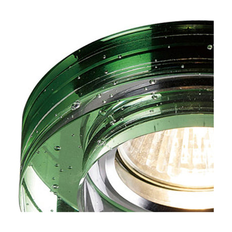 Close-up of a round green crystal downlight rim with a bubbled textured face, 95mm diameter over a 62mm cut-out, showing the chrome lampholder beneath.
