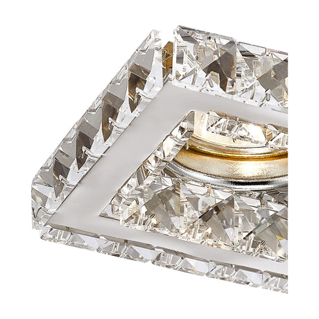 Close-up of the Galaxy Downlight square recessed fitting with a polished chrome frame and clear crystal detailing surrounding the GU10 aperture, shown against a plain white background.