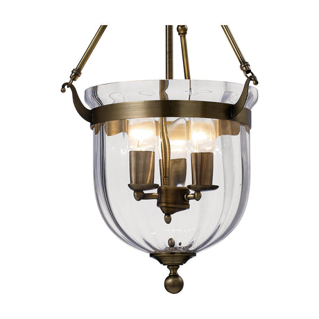 Aubrey 3 Light E14 Pendant Light 36cm in Antique Brass, with a clear bell-shaped glass shade housing three exposed candle bulbs, shown on a plain white background.