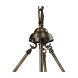 Close-up of the Aubrey 4 Light E14 Pendant Light in antique brass, showing the central hub with hooks and arms extending to hold clear glass shades, on a plain white background.