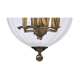 Close-up of the Aubrey 4 Light E14 Pendant Light 39cm in antique brass, showing candle-style arms and clear glass globe shade against a white background.