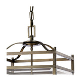 Close-up of the Aston 12 Light E14 pendant light's antique brass square frame and chain suspension, with clear glass panels and decorative crossbar detailing against a white background.