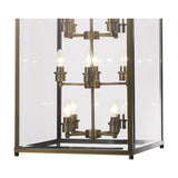 Close-up of the Aston 12 Light E14 Pendant Light in antique brass, showing candle-style bulbs on branching arms within a clear glass rectangular frame.