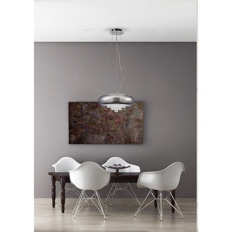 Phyllis 3 Light G9 Pendant Light 35cm in polished chrome with a shallow round shade and crystal drops, shown hanging above a dining table with white chairs.