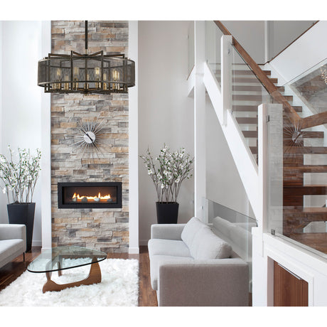 Parker 9 Light E27 Pendant Light 70cm in weathered zinc with brushed nickel detail, hung in a double-height living room above a stone fireplace and staircase.