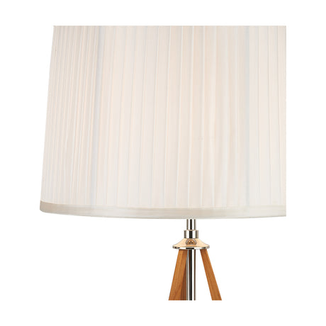 Close-up of the Hilton E27 Table Lamp 40cm showing the pleated white fabric shade, polished nickel neck fitting, and tripod wood legs on a plain background.
