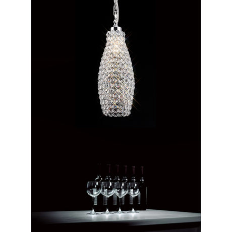 Kudo 13cm Crystal Lamp Shade in polished chrome, a tall drum-shaped pendant with faceted crystal beads, lit and hanging above a table set with wine glasses and bottles.