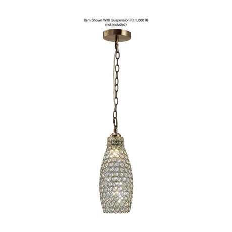 Kudo Lamp Shade 13cm in clear crystal with antique brass fitting, shown lit on a chain suspension against a plain white background.