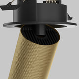 Close-up of the Artisan Single Tilt Round Recessed Downlight in matte gold, featuring a textured design on a stand. The light gray background highlights its modern elegance.