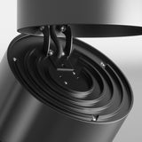 Close-up of the Yin LED Dimmable Single Spotlight 15W 4000K - Black, showcasing its structured interior against a neutral background. The spotlight is partially open, revealing visible screws and sleek, minimalist design under task-oriented lighting for precision.