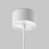 The Artisan 1 Light Long Round Pendant in white features a textured cylindrical shade with a diamond pattern on gray, hanging elegantly from a straight rod for added sophistication to any room.