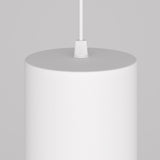 The Orlo LED Pendant Light 4000K - White is a close-up view showing its textured cylindrical design, hanging by a thin white cord. Ideal for modern spaces, it features an adjustable suspension against a neutral gray backdrop.