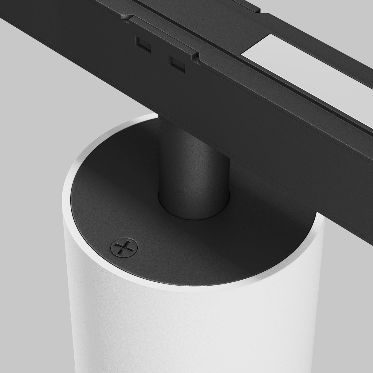 Close-up of the Alfa S LED Magnetic Exility Track Downlight 7W 3000K in white, with a minimalist base and horizontal arm. A screw is visible on top against the plain light gray background, providing energy-saving warm 3000K illumination.