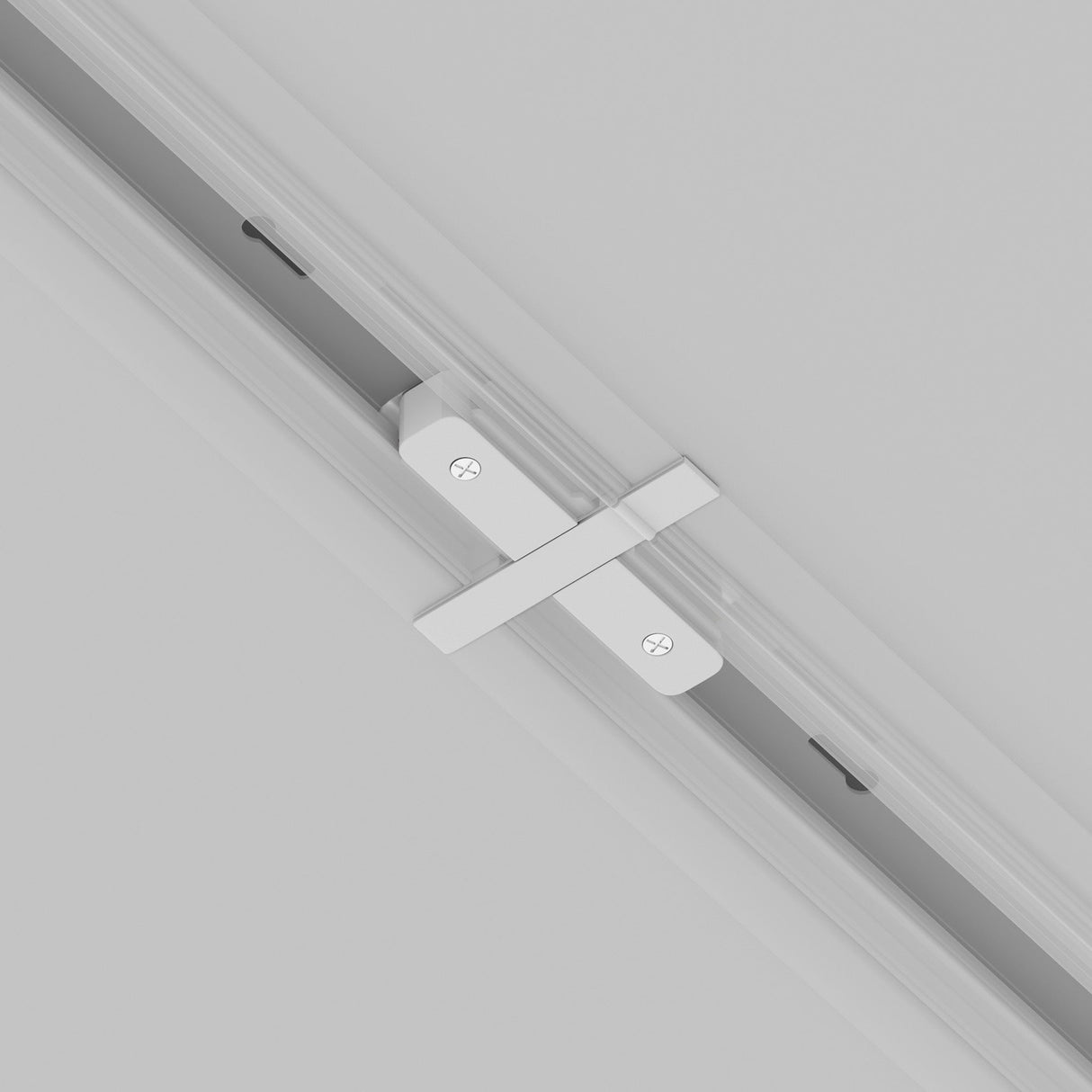 Close-up of the Unity Tracks Recessed Straight Connector - White, featuring a single metal connector and two screws, seamlessly integrating into the sleek lighting system. The diagonal white rail against a light gray background resembles recessed track lighting.