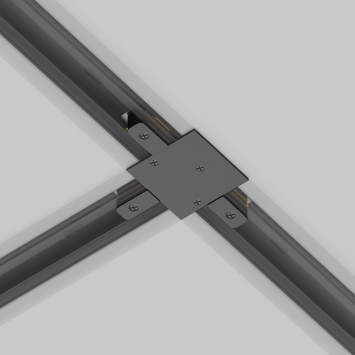 Close-up of a Unity Tracks Recessed T-Connector - Black, seamlessly joining translucent beams on a smooth white surface, with a sleek cross-shaped joint that enhances the elegance of the architectural detail.
