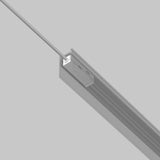 A close-up of the Exility Track Power Feed in white, featuring a sleek design with visible connectors resembling track lighting. It has a gray linear fixture with a suspended power cable against a light gray background and is powered by DC 48V for versatile installations.