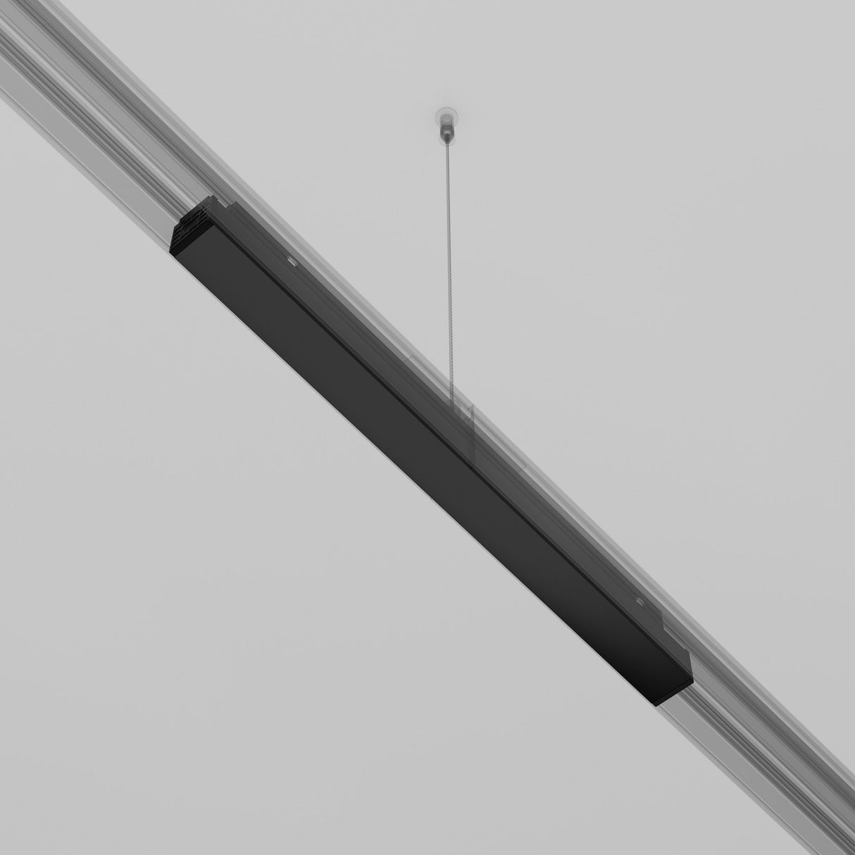 A sleek black pendant light hangs from the ceiling, using the Exility Recessed Track Power Supply 200W - Black, which seamlessly integrates into the gray ceiling for a minimalist, contemporary look with efficient recessed track lighting.