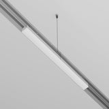 The Exility Recessed Track Power Supply 200W in white seamlessly integrates with 48V systems, featuring a sleek linear light fixture suspended by two thin cables, offering a minimalist design with a silver metallic casing and a white diffuser panel for even light distribution.