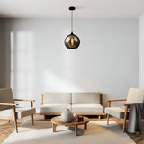 A minimalist living room features a white sofa, two beige armchairs, and a round wood coffee table with a gray vase. The Bergen Pendant Light - Black with Matt Smoky Glass Shade & Rain Jets Effect hangs from the ceiling, enhancing the neutral tones for modern elegance in this calm space.