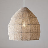 Jahari Woven Jute Pendant Light in natural tones, large dome-shaped open weave shade with visible seams and rust-coloured cord, lit bulb visible through mesh against a plain grey background.