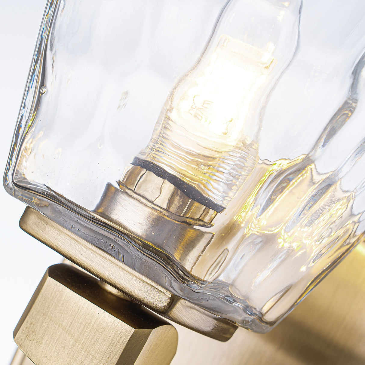 Marant 1 Light Wall Light - Champagne Bronze with Clear Water Glass
