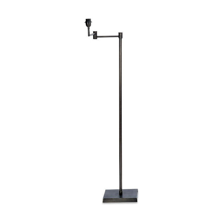 Kara Adjustable Iron Floor Lamp Base in aged bronze, with square flat plate, slim column, and swing arm pivoting to one side, shown on a plain white background.