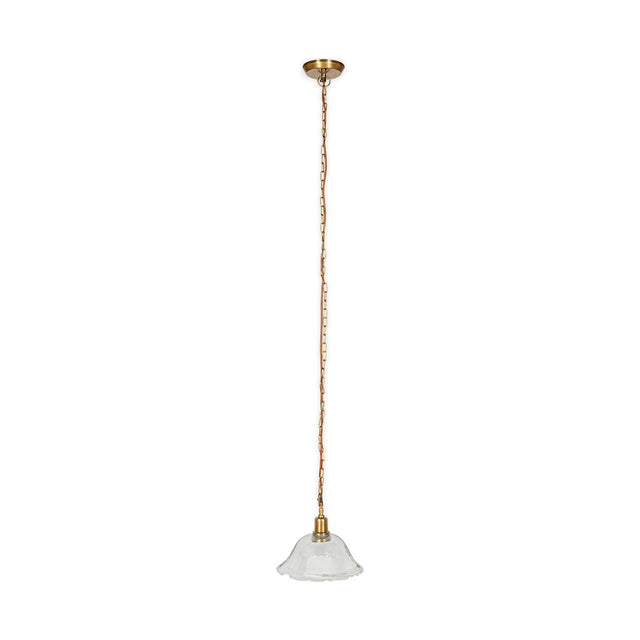 Keju Recycled Glass Pendant Light in Clear, a wide shallow glass bell with rippled rim on a brass collar, suspended from a long brass chain with rust fabric flex, shown on a plain white background.