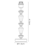 Line drawing of the Renee 1 Light Crystal Table Lamp in silver, featuring a stacked, faceted crystal base (41.5 cm tall, 11.5 cm diameter) for decorative lighting, topped with a round platform and lamp holder. Shade not included.