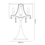 Line drawing of the Trace 3 Light Crystal Table Lamp in chrome with a chrome shade, two candle-style bulbs, crystal beaded chains, a curved base, and dimensions marked as 62 cm high x 40 cm wide.