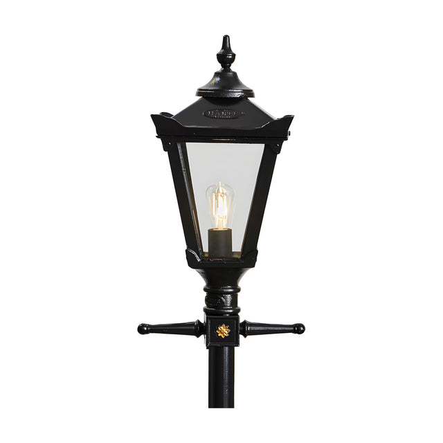 Victorian-style black cast iron replacement lantern head with clear glass panels and a lit bulb, fitting a 62mm spigot, shown on a plain white background.