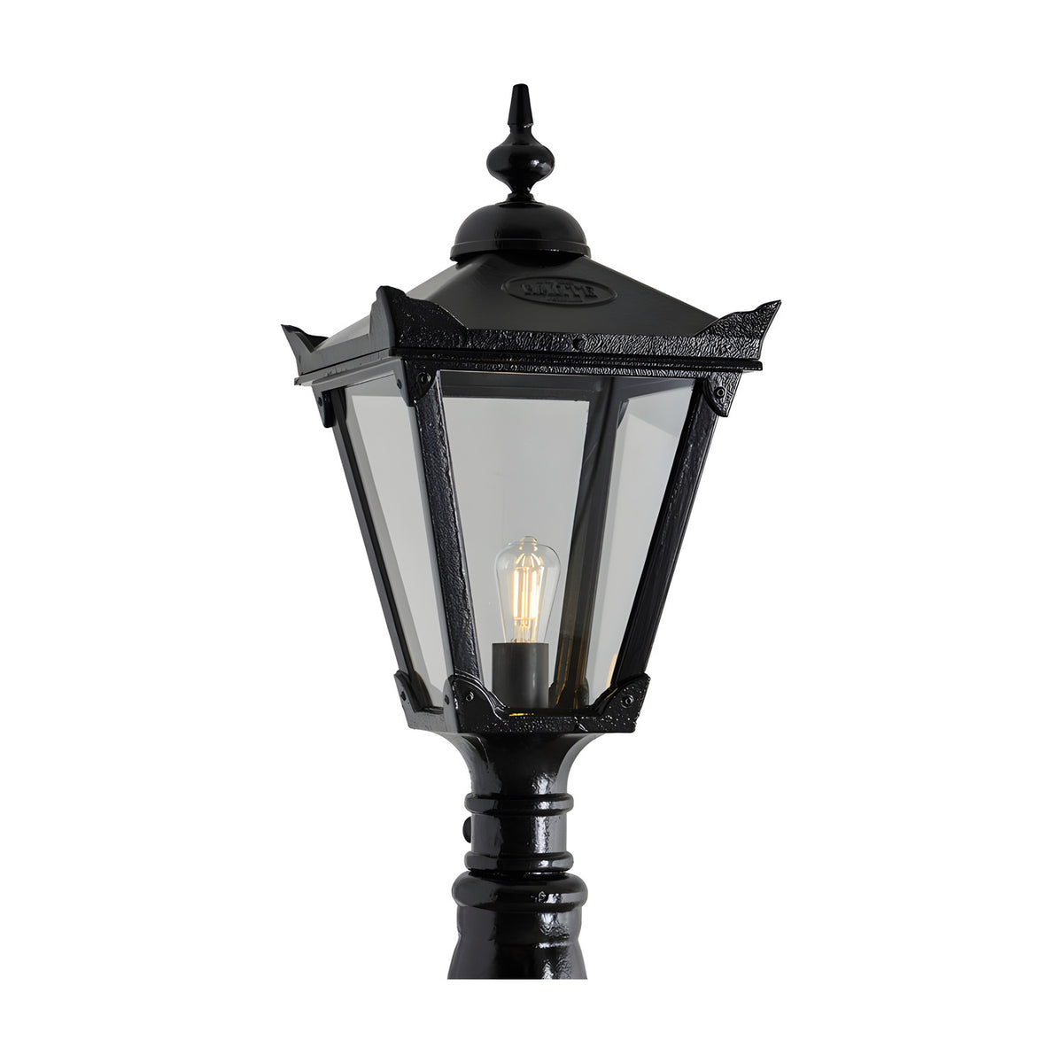 Victorian Manor replacement lantern head in black metal, hexagonal design with clear glass panels and an exposed filament bulb, shown against a plain white background.