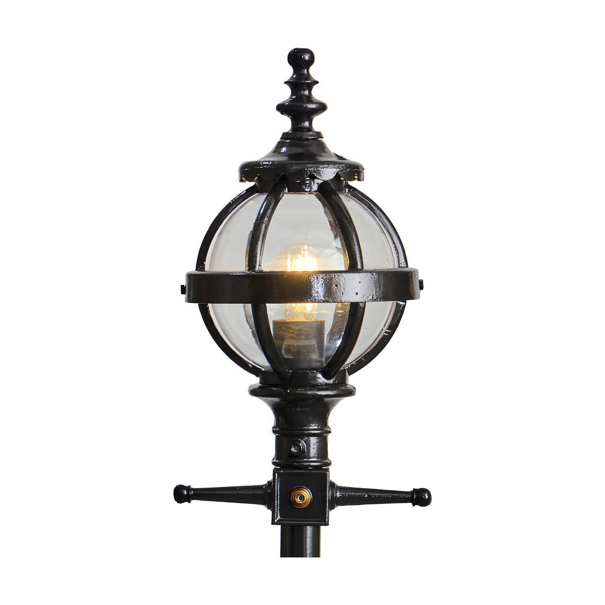 Cast Iron Replacement Globe Lantern head in black with clear glass panels and ornate finial, fitted with a lit bulb on a 44mm spigot mount, shown on a plain white background.