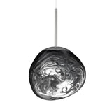 The Lava Small LED Pendant Light - Silver features a round, uneven glass shade with a swirling black and white marbled pattern, suspended from a slim metal rod and adjustable cable.