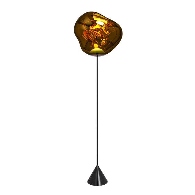 The Lava LED Floor Lamp - Gold features a slim black stand, cone-shaped base, and amber-tinted glass shade. Its glossy finish and abstract design evoke molten effects for a modern, organic statement piece.