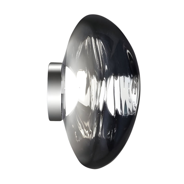 The Lava Large LED Wall & Ceiling Light - Silver features a sleek, dome-shaped glass cover and metallic base with ambient illumination, shown here against a plain white background.